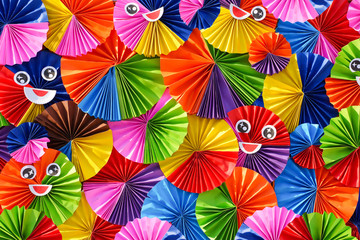 Fototapeta na wymiar Colorful origami paper backdrop