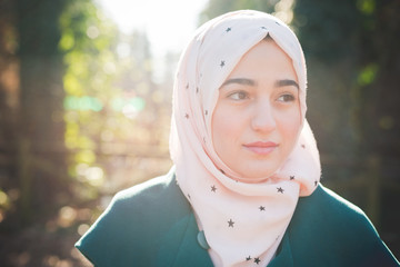 young beautiful muslim woman at the park