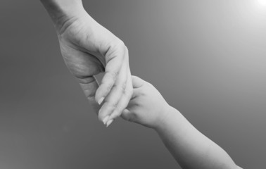 hands of mother and child