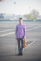 young crazy funny musician violinist asian man