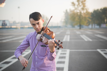 young crazy funny musician violinist asian man