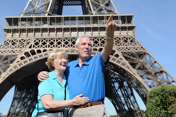 Senior couple in front of Eiffel Tower