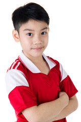 Portrait of Happy asian cute boy in red sport uniform