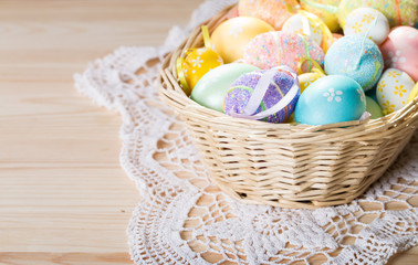 Easter eggs in  wicker basket