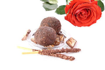 Cupcake with chocolate on wooden background