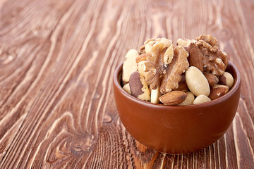 Mix nuts  on wooden  background