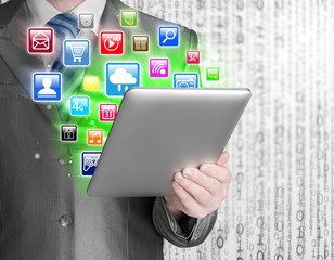 Business man use tablet pc with colorful application icons