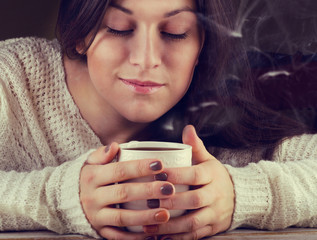 Young Woman holding a tea cup