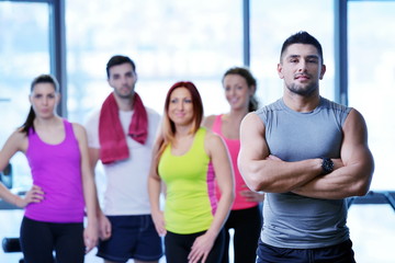 Group of people exercising at the gym