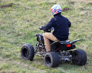 Young man on a quad