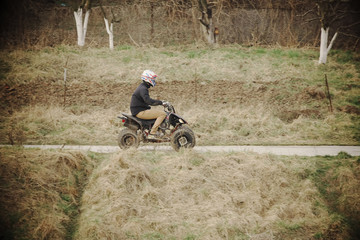 Young man on a quad