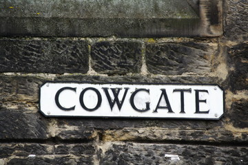 cowgate street sign in edinburgh