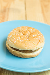 hamburger on wood background