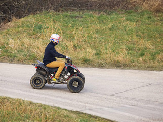 Young man on a quad