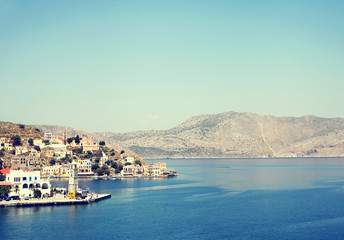 Fototapeta premium Landscape of island Symi, Greece. Panorama of the part city