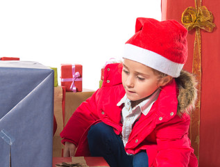 Little girl with several presents