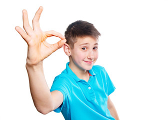 Portrait of a boy pointing finger showing  expressive emotions