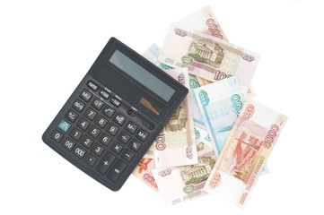 Russian money and calculator on white background.
