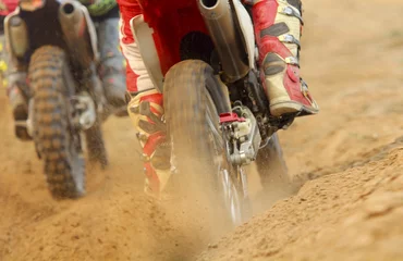 Zelfklevend Fotobehang motocross racer accelerating speed in track © toa555