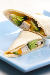 burrito with chicken meat and broccoli