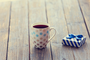 Cup of coffee and gift box
