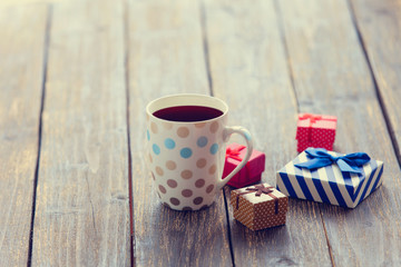 Cup of coffee and gift box