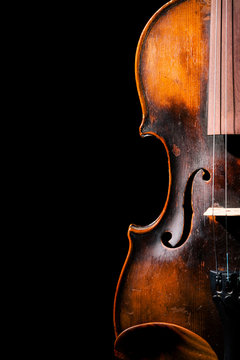 Vintage violin on black background