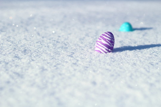 Easter background: Two eggs in the snow