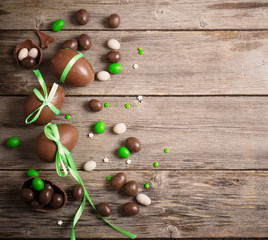 Chocolate Easter Eggs Over Wooden Background