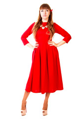 Young woman in a bright red evening dress