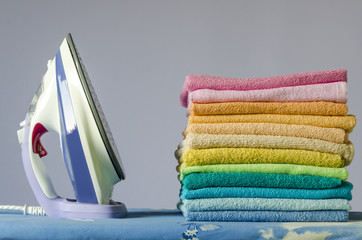 Ironing colorful towels