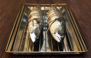 Raw mackerel fish ready for smoke-dried