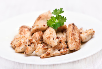 Chicken grill meat sliced on white plate