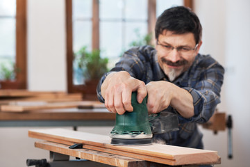 DIY, sanding old wooden planks