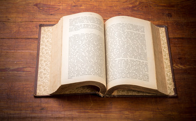 Open Book on old wood background