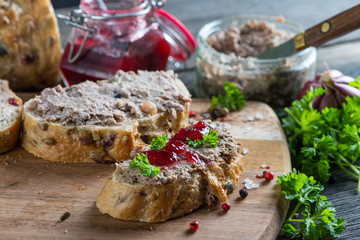 chicken liver or goose pate on wholegrain bread and cranberry