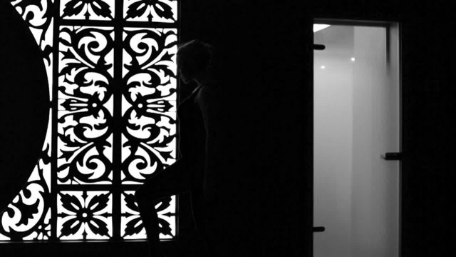 Beautiful young sexy woman perfect body shape moving shadows