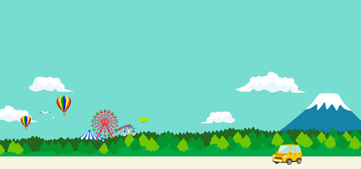 遊園地と山