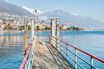Fototapeten Pier on lake Maggiore, Locarno © EleSi