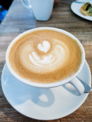 cappuccino on the wood table