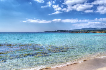 Le Bombarde beach foreshore on a clear day in hdr