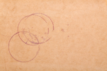 Wine stains on brown paper © Evgeny Karandaev