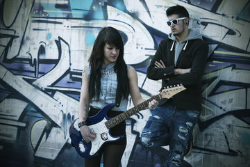 Fototapeta na wymiar couple with electric guitar