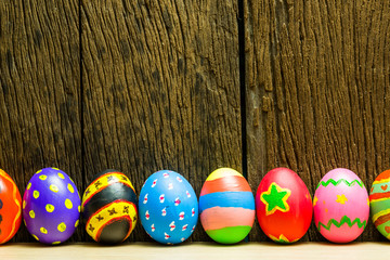 Easter eggs on wood background