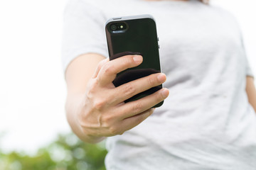 Close up of hand using mobile smart phone