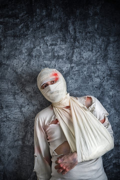 Injured Man with Head Bandages