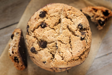 Pile of chocolate cookies with a glass of milk