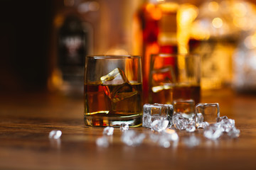 Whiskey drinks on wood