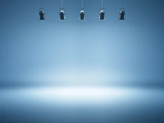 Poster blauwe spotlightachtergrond met studiolampen © SFIO CRACHO