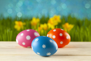 Colored Easter eggs on blue background